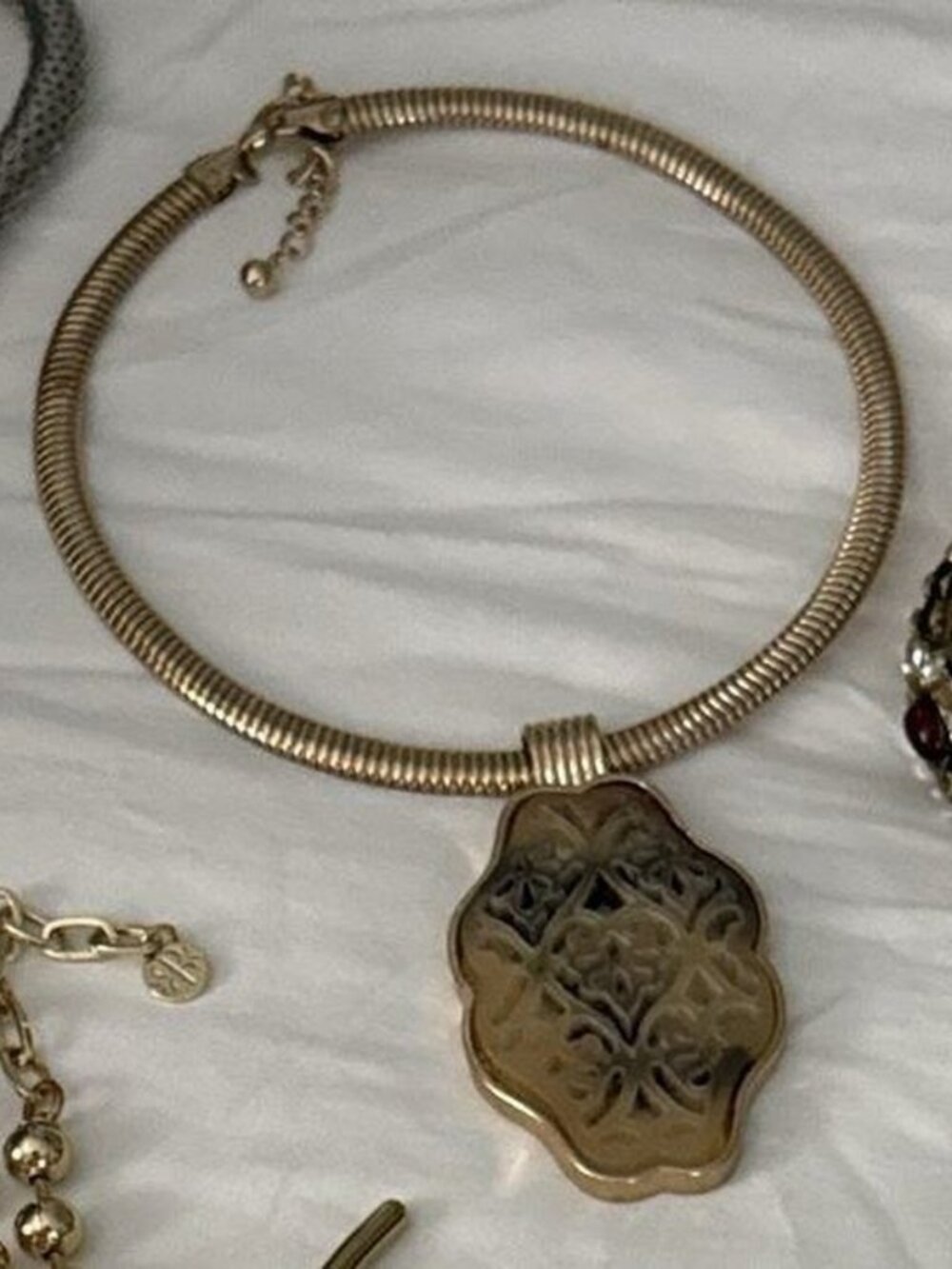 Gold Omega Collar with Engraved Pendant